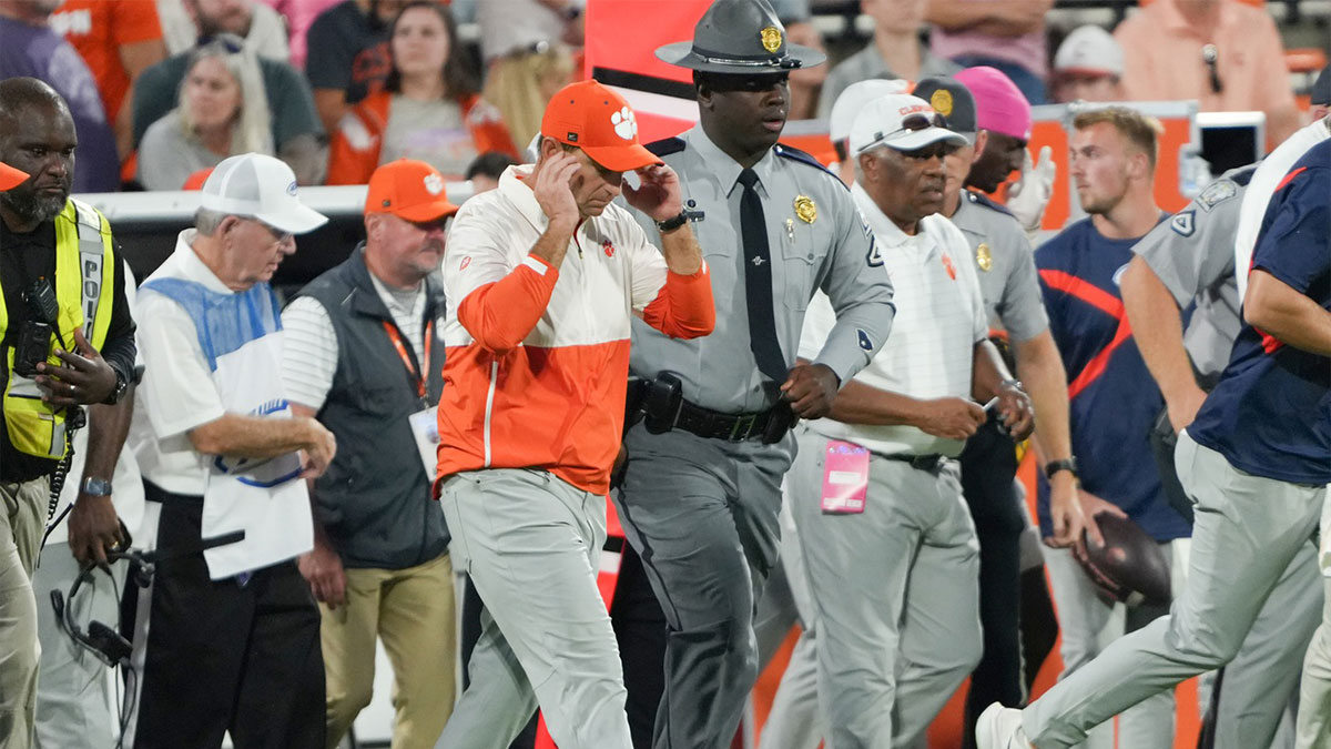 Clemson Tigers head coach Dabo Swinney walks over to meet Southern Methodist Mustangs head coach Rhett Lashlee (not shown) after the game at Memorial Stadium.