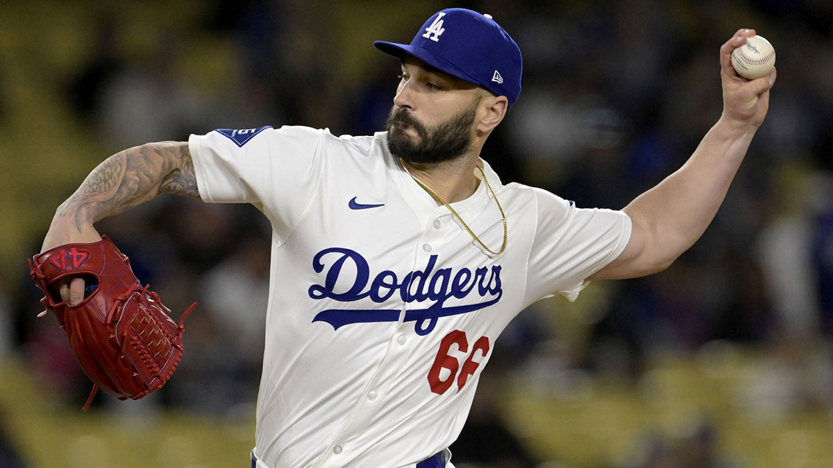 Los Angeles Dodgers relief pitcher Tanner Scott (66) earns a save against the Colorado Rockies at Dodger Stadium.