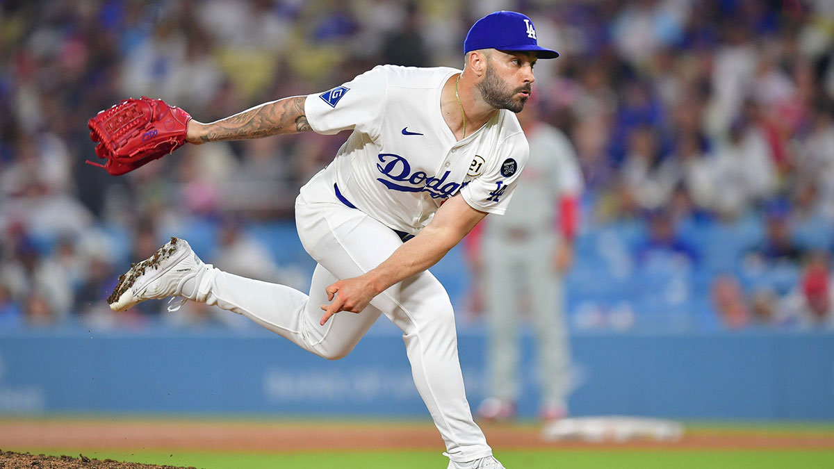 Los Angeles Dodgers pitcher Tanner Scott (66) throws against the Philadelphia Phillies during the ninth inning at Dodger Stadium.