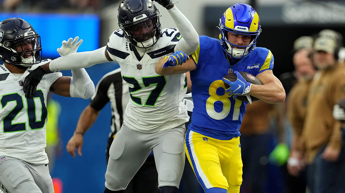 Los Angeles Rams wide receiver Austin Trammell (81) runs against Seattle Seahawks cornerback Riq Woolen (27) in the second quarter at SoFi Stadium.