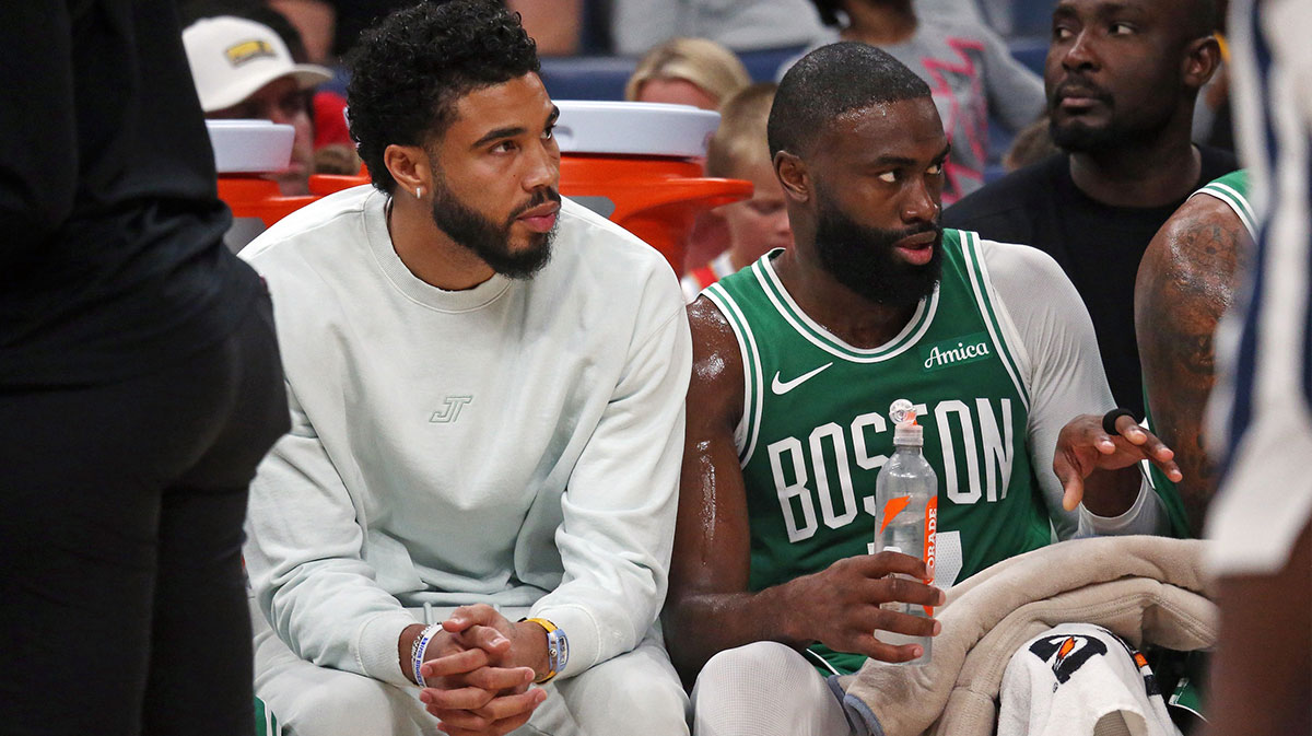 Boston Celtics forward Jayson Tatum (0) and guard Jaylen Brown (7) look on from the bench during the second quarter against the Memphis Grizzlies at FedExForum.
