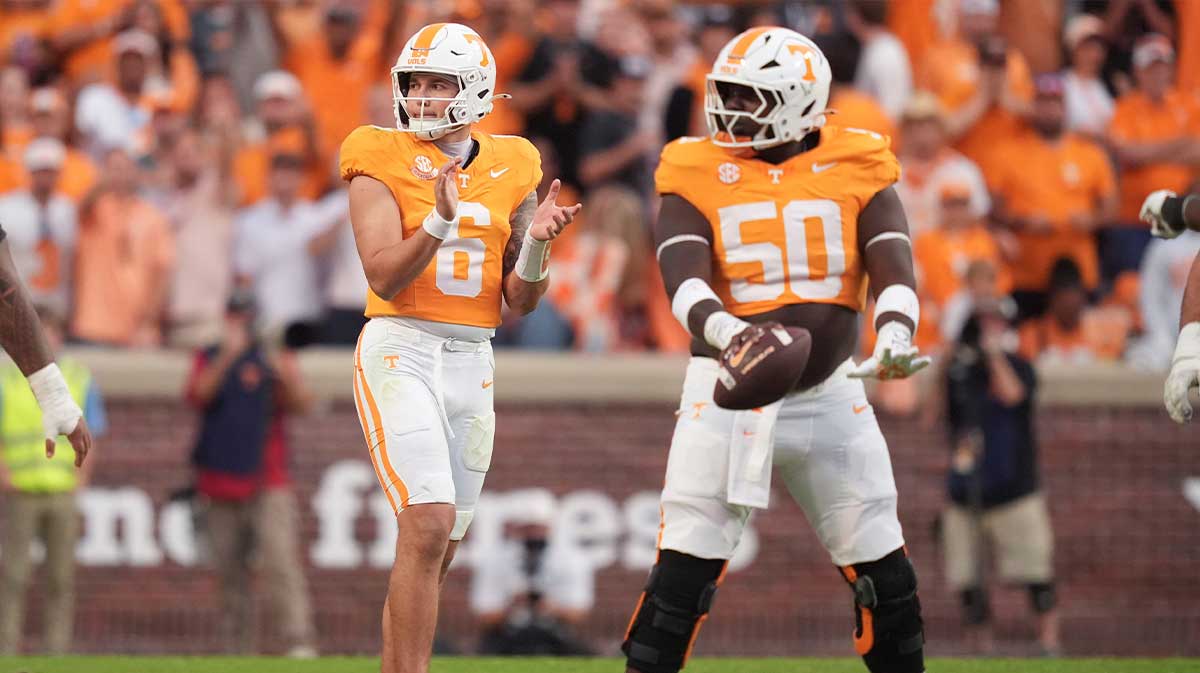 Tennessee quarterback Joey Aguilar (6) claps on the field during a college football game between Tennessee and Arkansas at Neyland Stadium in Knoxville, Tennessee on Oct. 11, 2025.
