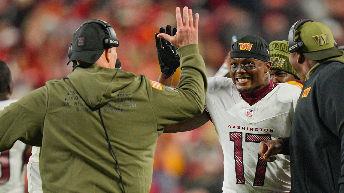 Washington Commanders wide receiver Terry McLaurin (17) celebrates after a touchdown against the Kansas City Chiefs during the second quarter of the game at GEHA Field at Arrowhead Stadium.