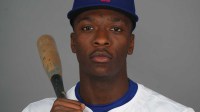 Texas Rangers player Sebastian Walcott poses for a photo during Media Day at Surprise Stadium.