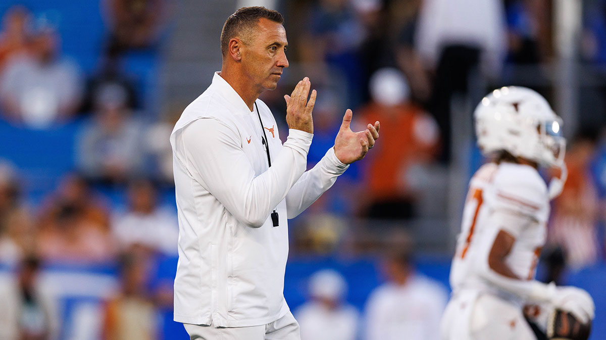 Texas Longhorns head coach Steve Sarkisian claps during warmups before the game against the Kentucky Wildcats at Kroger Field.