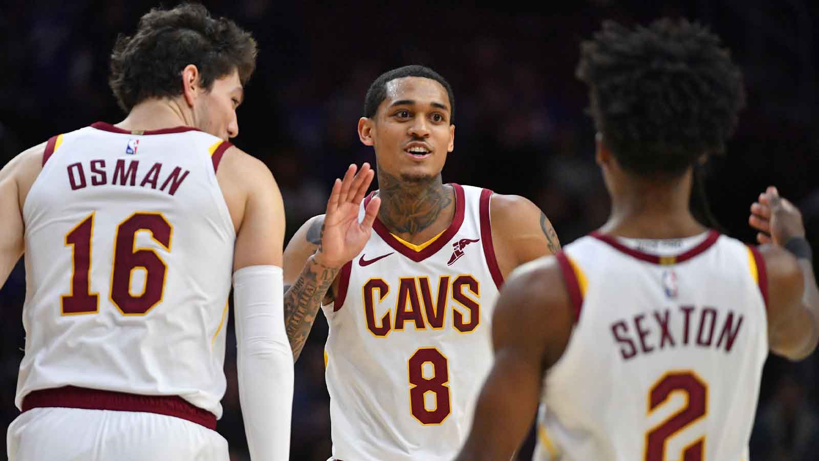 Cleveland Cavaliers guard Jordan Clarkson (8) celebrates with forward Cedi Osman (16) and guard Collin Sexton (2) against the Philadelphia 76ers during the fourth quarter at Wells Fargo Center.