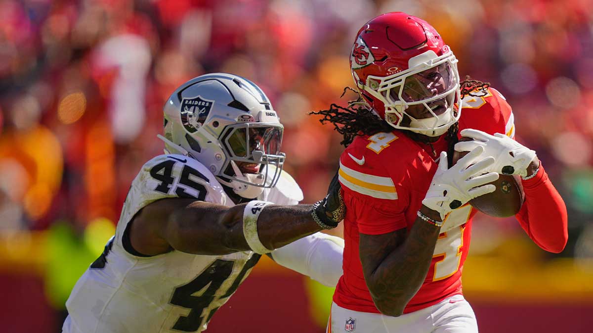 Kansas City Chiefs wide receiver Rashee Rice (4) makes a reception defended by Las Vegas Raiders linebacker Devin White (45) during the second quarter of the game at GEHA Field at Arrowhead Stadium. 