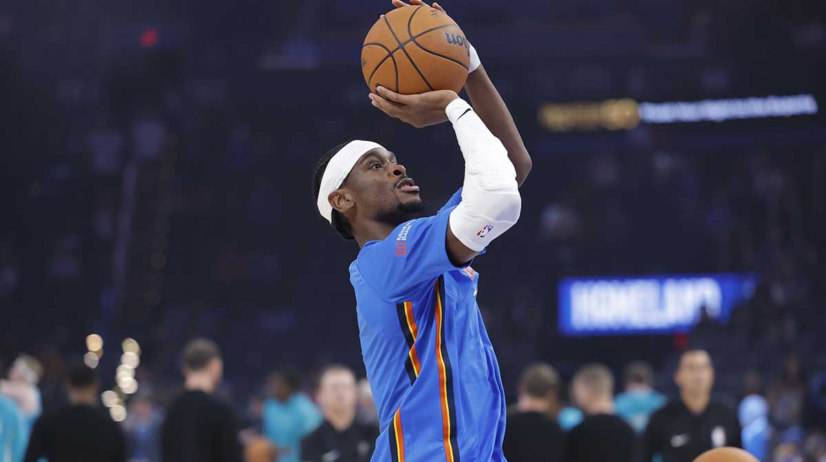Thunder guard Shai Gilgeous-Alexander warms up before the start of a game between the Charlotte Hornets and the Oklahoma City Thunder at Paycom Center