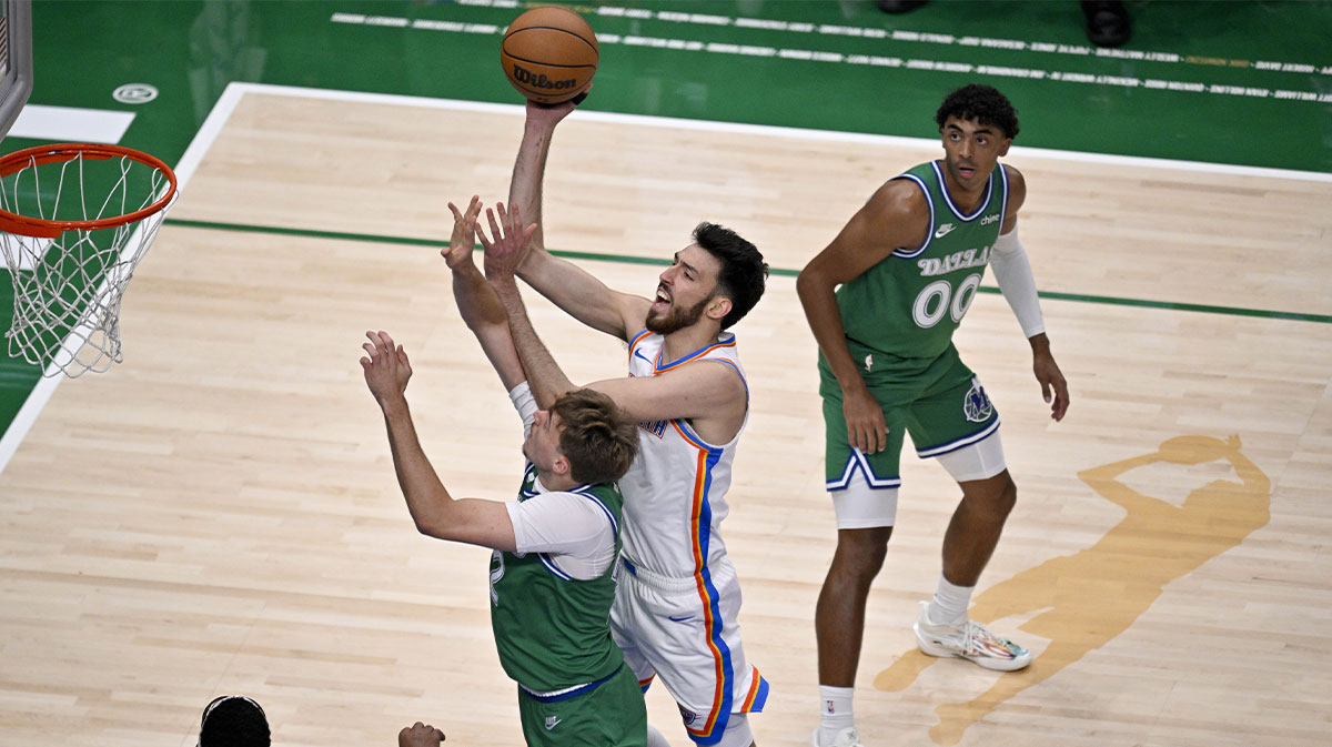 Thunder center Chet Holmgren (7) drives to the basket