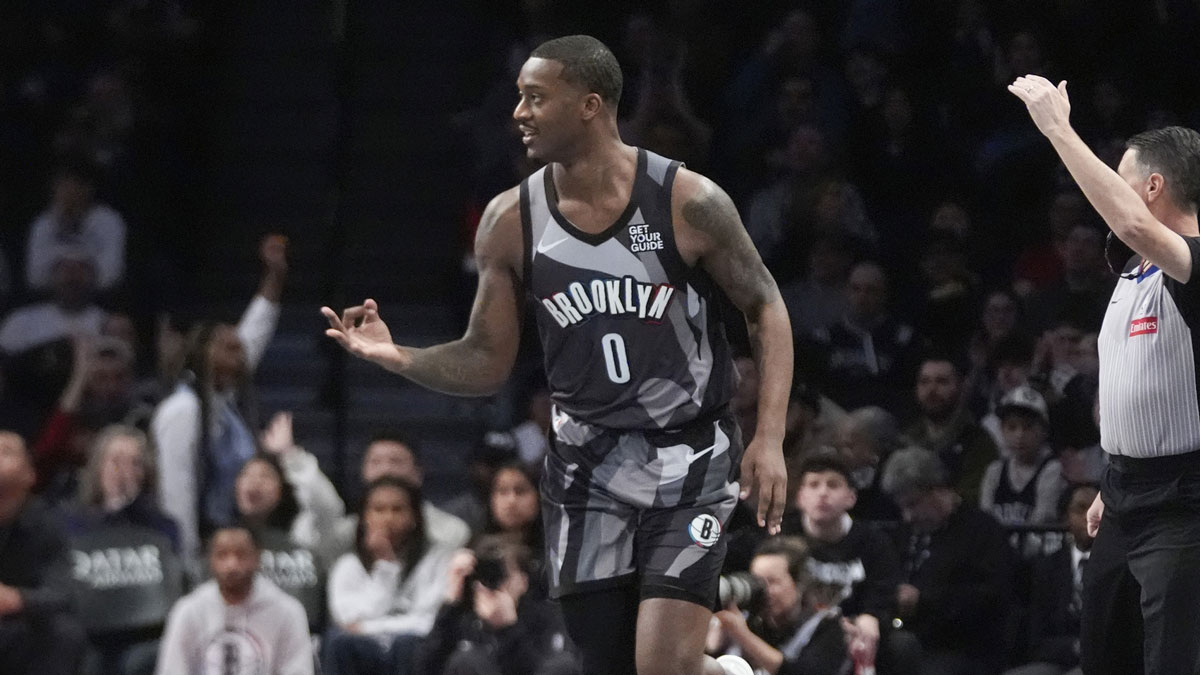Nets forward Dariq Whitehead (0) reacts to making a three point shot against the Toronto Raptors during the first half at Barclays Center