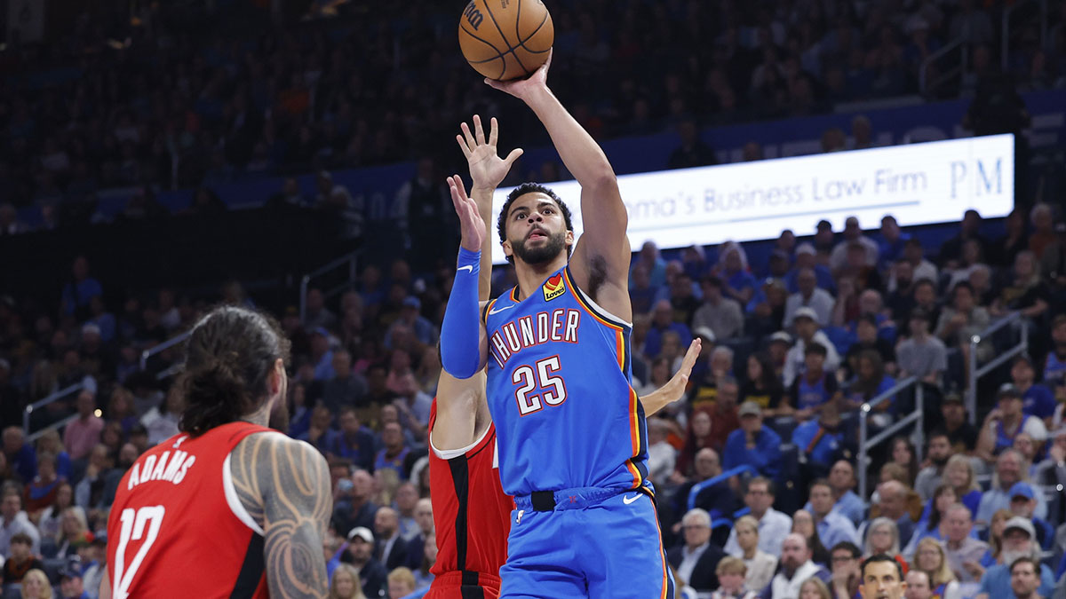 Thunder guard Ajay Mitchell (25) shoots against the Houston Rockets during the first half at Paycom Center