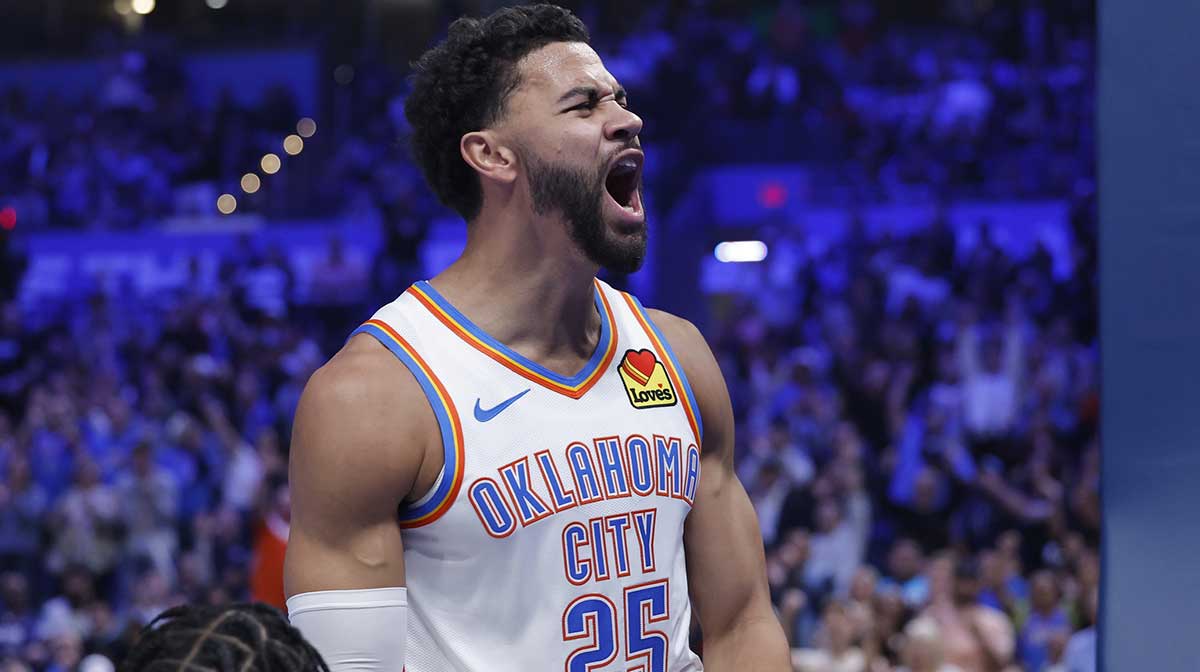 Thunder guard Ajay Mitchell (25) celebrates after scoring against the Sacramento Kings during the second half at Paycom Center