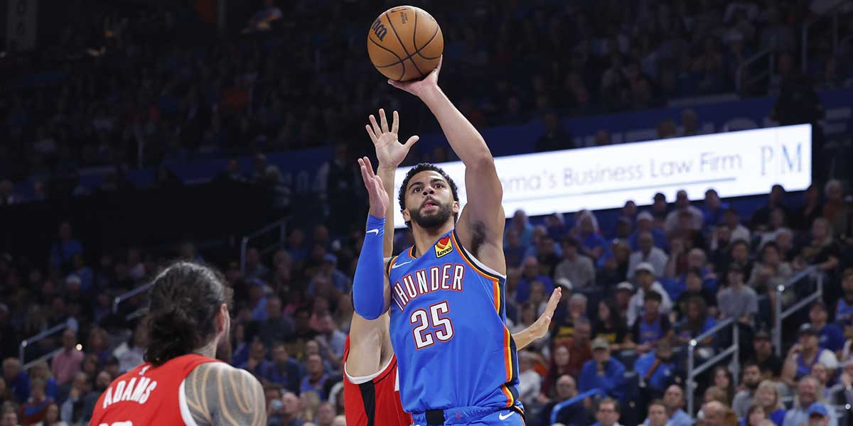 Thunder guard Ajay Mitchell (25) shoots against the Houston Rockets during the first half at Paycom Center