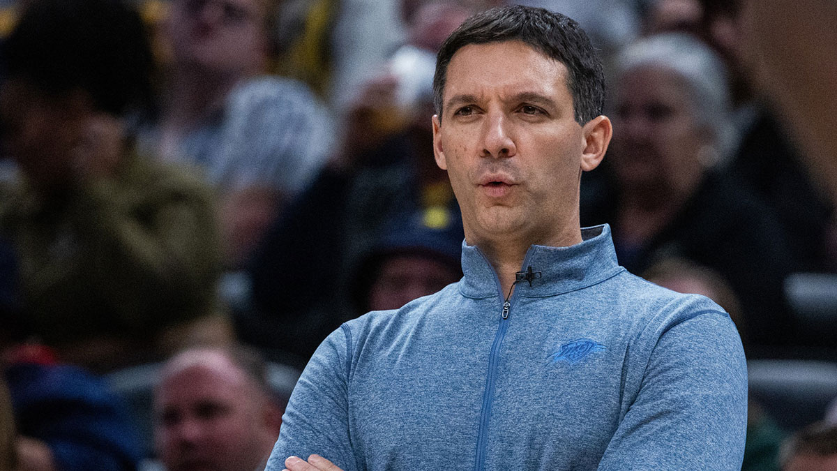 Thunder head coach Mark Daigneault in the second half against the Indiana Pacers at Gainbridge Fieldhouse with Thunder guard Nikola Topic in the background
