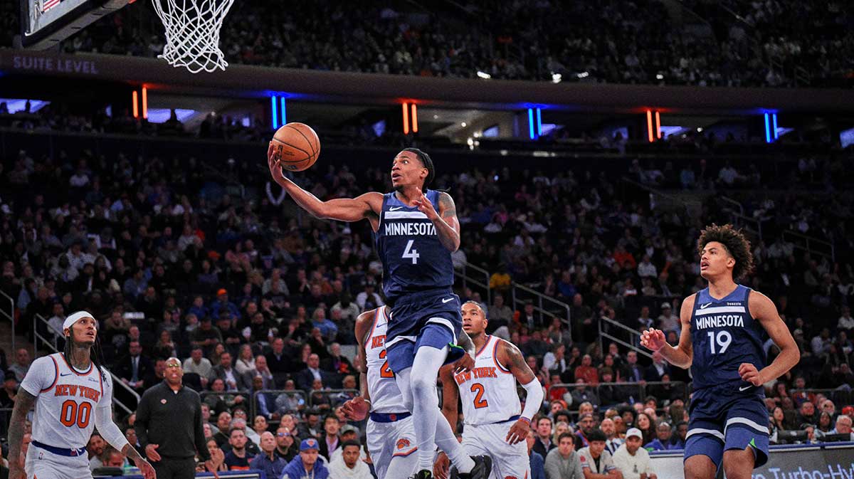 Minnesota Timberwolves guard Rob Dillingham (4) drives to the basket against the New York Knicks during the first half at Madison Square Garden.