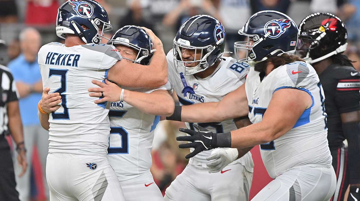 Tennessee Titans kicker Joey Slye (6) celebrates making a 29-yard field goal with holder Johnny Hekker (3) and teammates as time expires during the fourth quarter against the Arizona Cardinals at State Farm Stadium.
