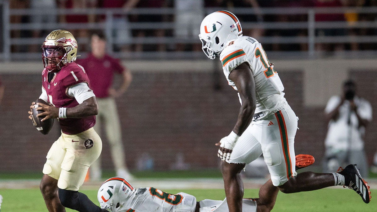 Florida State Seminoles quarterback Tommy Castellanos (1) looks to pass as a defender grabs his ankle. The Miami Hurricanes defeated the Florida State Seminoles 22-28 at Doak Campbell Stadium on Saturday, Oct. 4, 2025.