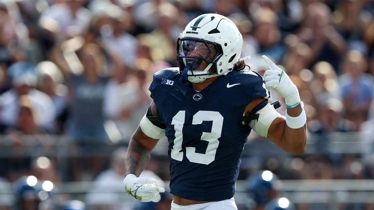 Penn State Nittany Lions linebacker Tony Rojas (13) reacts following a sack on Villanova Wildcats quarterback Tanner Maddocks (3) during the second quarter at Beaver Stadium.