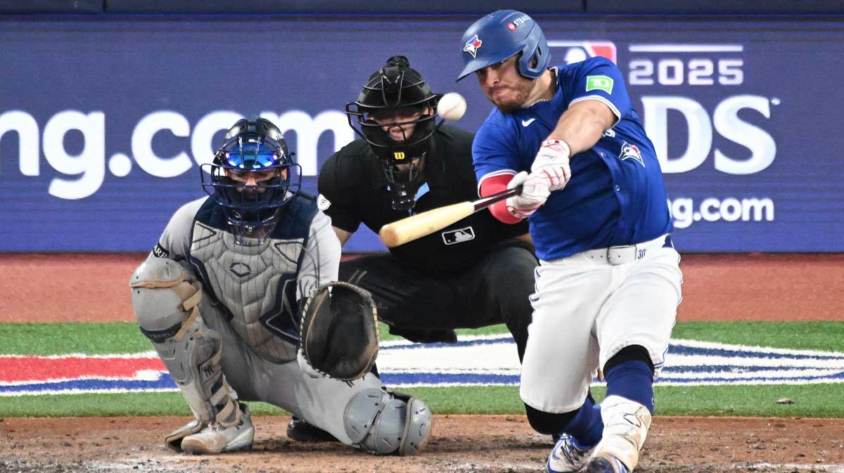 Toronto Blue Jays catcher Alejandro Kirk (30) hits a home run in the eighth inning against the New York Yankees during game one of the ALDS round for the 2025 MLB playoffs at Rogers Centre.