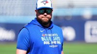 Toronto Blue Jays manager John Schneider (14) before game one against the New York Yankees in the ALDS round for the 2025 MLB playoffs at Rogers Centre.