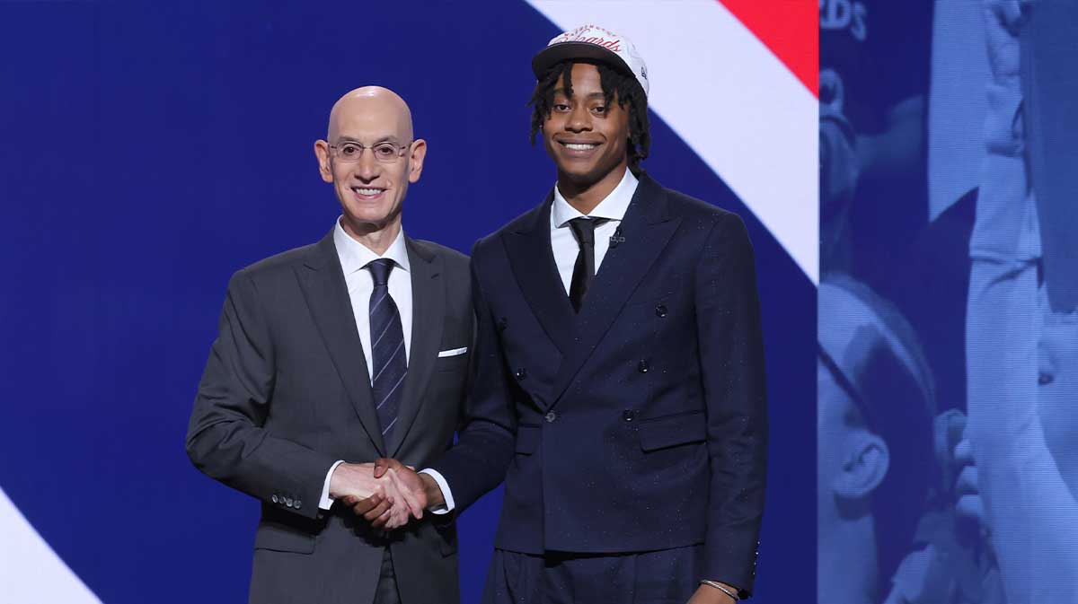 Tre Johnson stands with NBA commissioner Adam Silver after being selected as the sixth pick by the Washington Wizards in the first round of the 2025 NBA Draft at Barclays Center.