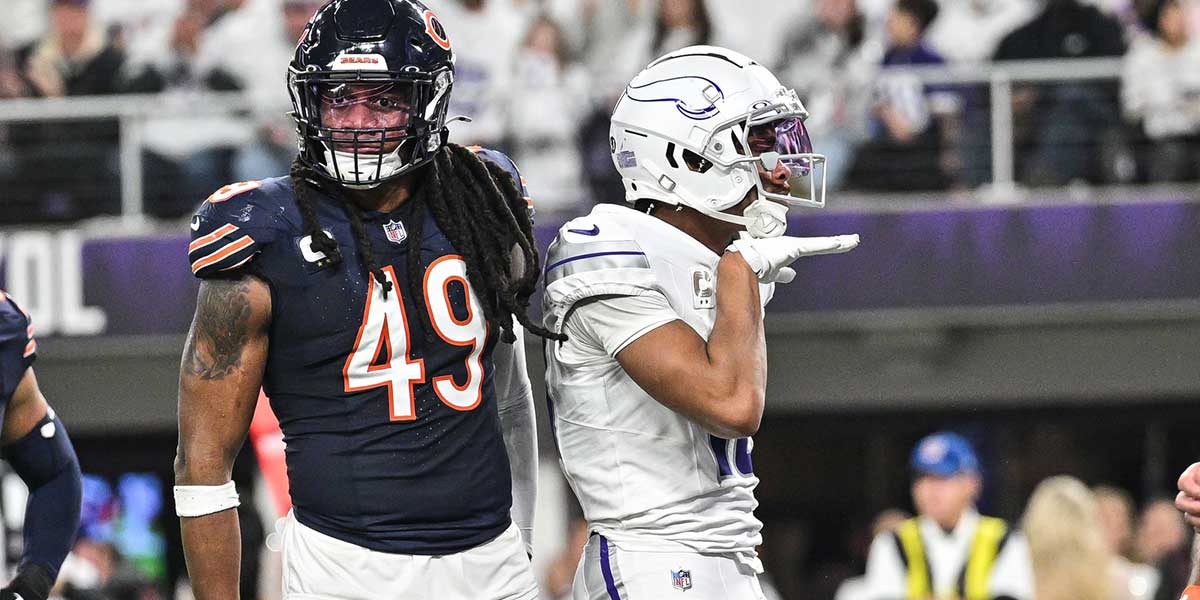 Detroit Lions running back Jahmyr Gibbs (26) runs against Chicago Bears linebacker Tremaine Edmunds (49) during the first half at Soldier Field in Chicago, Ill. on Sunday, Dec. 22, 2024.