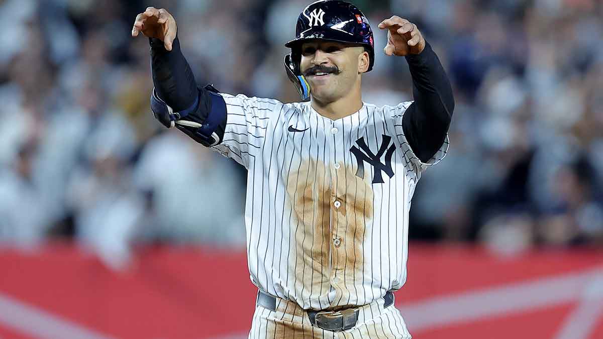 New York Yankees center fielder Trent Grisham (12) celebrates his double against the Boston Red Sox during the seventh inning of game two of the Wildcard round of the 2025 MLB playoffs at Yankee Stadium.