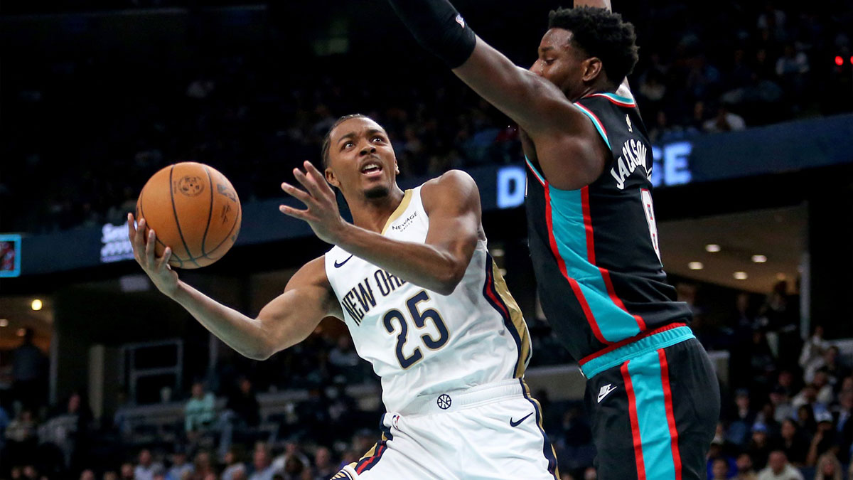 New Orleans Pelicans forward Trey Murphy III (25) shoots as Memphis Grizzlies forward/center Jaren Jackson Jr. (8) defends during the third quarter at FedExForum.