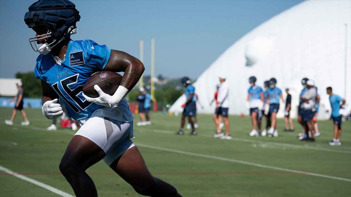 Tennessee Titans wide receiver Treylon Burks (16) runs after a catch during the Tennessee Titans first day of training camp at Ascension Saint Thomas Sports Park.
