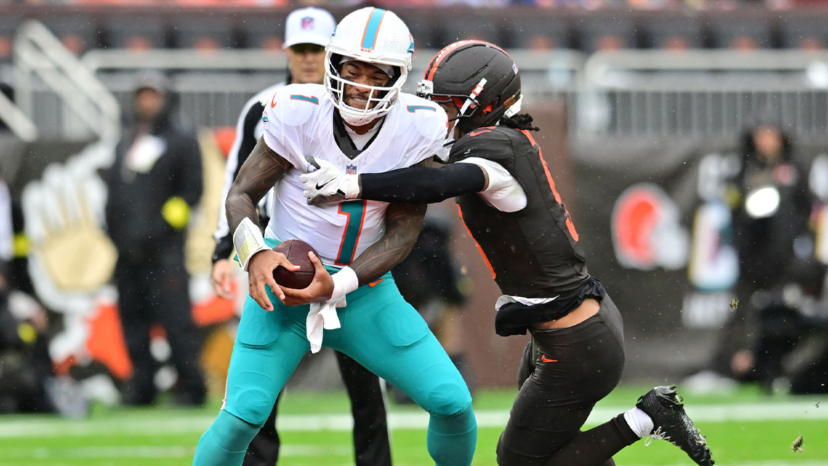 Cleveland Browns safety Grant Delpit (9) sacks Miami Dolphins quarterback Tua Tagovailoa (1) during the first half at Huntington Bank Field.