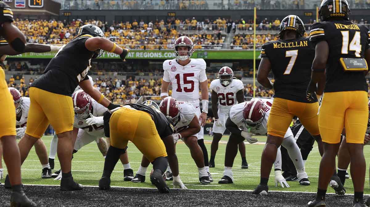 Alabama Crimson Tide quarterback Ty Simpson (15) lines up in the red zone against the Missouri Tigers during the third quarter at Faurot Field at Memorial Stadium.