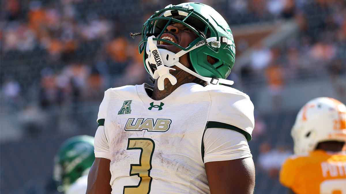 UAB Blazers running back Isaiah Jacobs (3) celebrates after scoring a touchdown against the Tennessee Volunteers during the second half at Neyland Stadium.