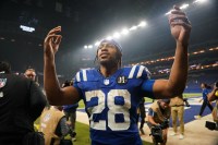 Indianapolis Colts running back Jonathan Taylor (28) celebrates after the game against the Tennessee Titans at Lucas Oil Stadium.