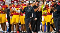 USC Trojans head coach Lincoln Riley celebrates after kicker Ryon Sayeri (48) hit a 54-yard field goal in the second half against the Michigan Wolverines at United Airlines Field at the Los Angeles Memorial Coliseum.