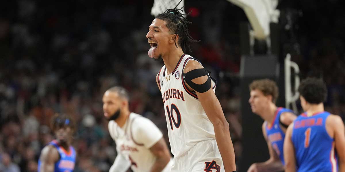 Auburn Tigers guard Chad Baker-Mazara (10) reacts after making a basket against the Florida Gators in the semifinals of the men's Final Four of the 2025 NCAA Tournament at the Alamodome.