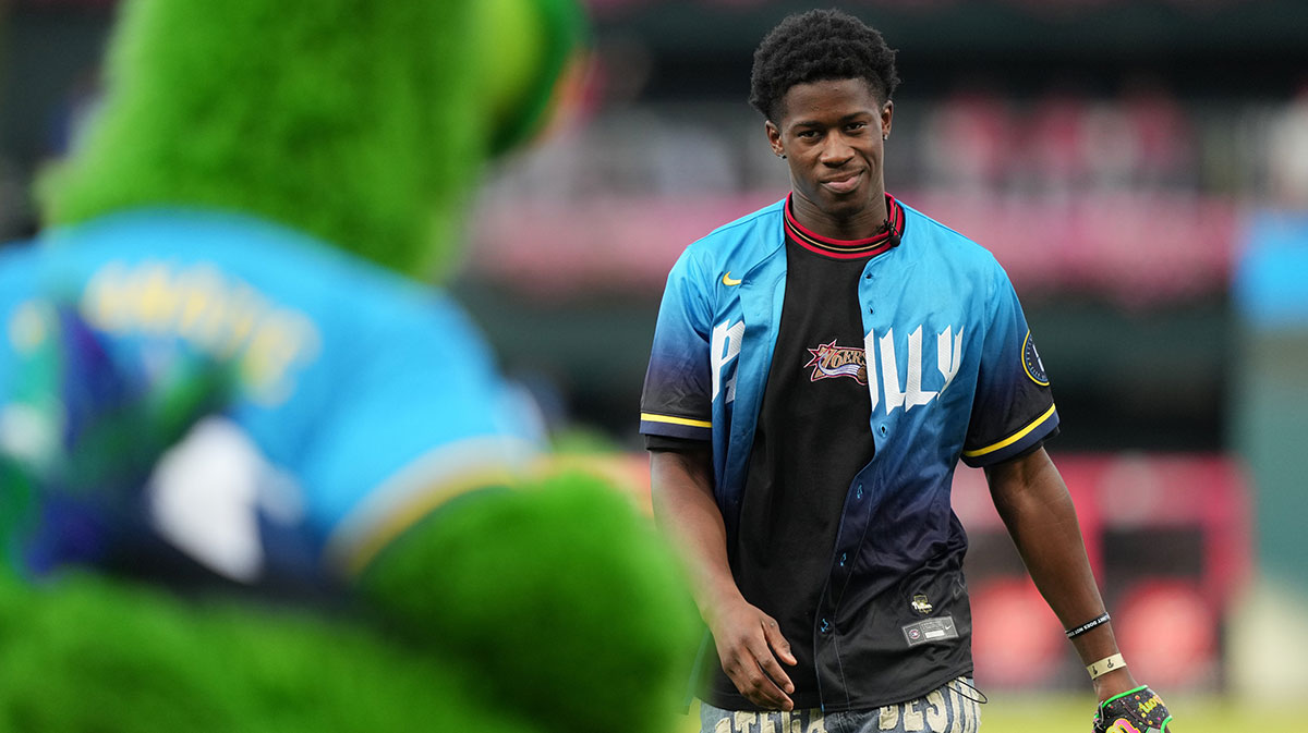Philadelphia 76ers draft pick V.J. Edgecombe looks on after performing a ceremonial pitch before the game between the Philadelphia Phillies and the Atlanta Braves at Citizens Bank Park.