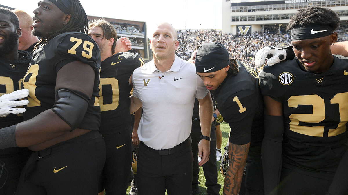 Vanderbilt Commodores head coach Clark Lea celebrates the win with his team and the student section against the Louisiana State Tigers during the second half at FirstBank Stadium.