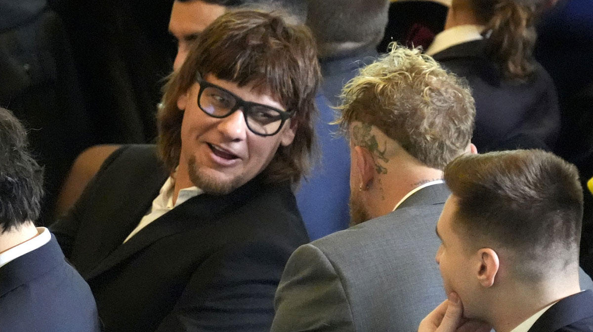 Comedian Theo Von, left speaks with Jake Paul in the viewing area in Emancipation Hall during the 2025 Presidential Inauguration at the U.S. Capitol.