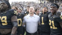 Vanderbilt Commodores head coach Clark Lea celebrates the win with his team and the student section against the Louisiana State Tigers during the second half at FirstBank Stadium.