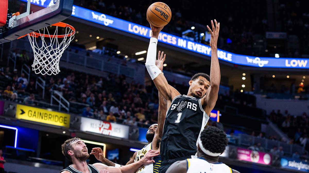 San Antonio Spurs forward/center Victor Wembanyama (1) rebounds the ball while Indiana Pacers forward Isaiah Jackson (22) defends in the first half at Gainbridge Fieldhouse.
