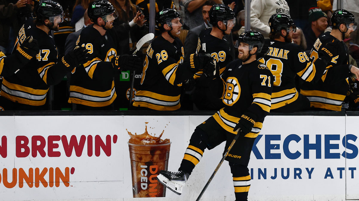 Boston Bruins left wing Viktor Arvidsson (71) is congratulated at the bench after scoring against the Colorado Avalanche during the first period at TD Garden.