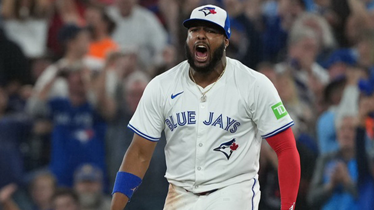 Oct 19, 2025; Toronto, Ontario, CAN; Toronto Blue Jays first baseman Vladimir Guerrero Jr. (27) celebrates after a double play in the fourth inning against the Seattle Mariners during game six of the ALCS round for the 2025 MLB playoffs at Rogers Centre. Mandatory Credit: Nick Turchiaro-Imagn Images