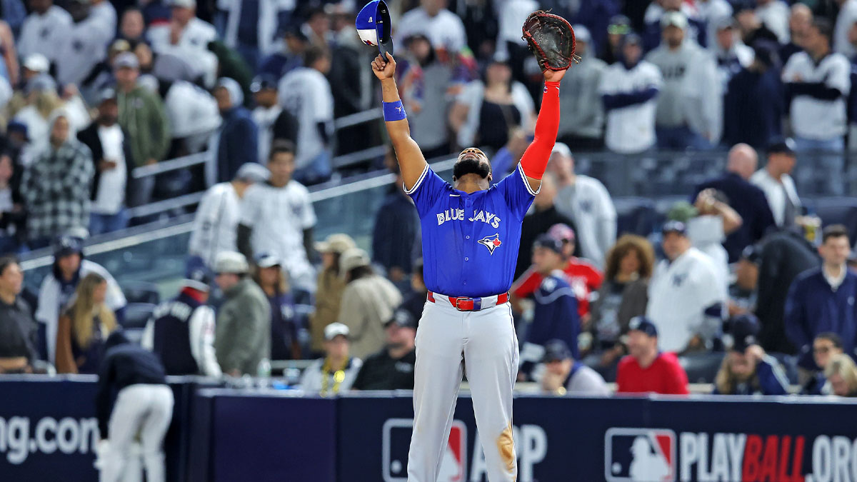 Toronto Blue Jays first baseman Vladimir Guerrero Jr. (27) celebrates after beating the New York Yankees to win the ALDS round for the 2025 MLB playoffs at Yankee Stadium.