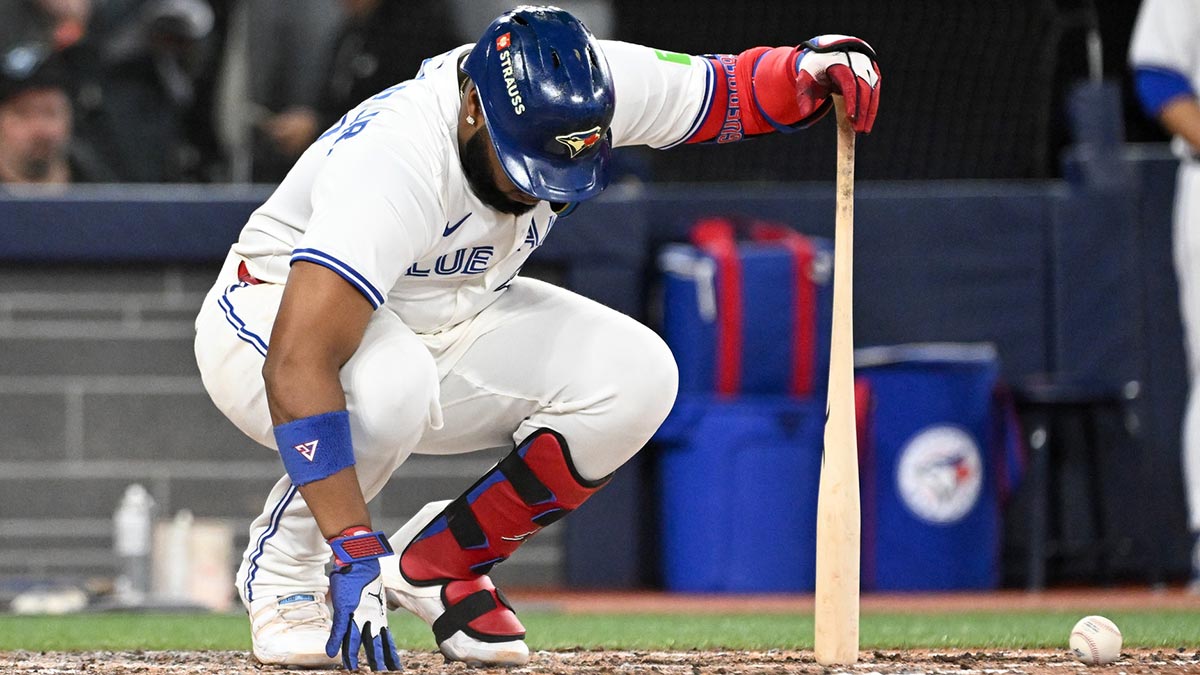 Toronto Blue Jays first baseman Vladimir Guerrero Jr. (27) reacts after being hit by a foul ball during his at bat against the Los Angeles Dodgers in the ninth inning during game two of the 2025 MLB World Series at Rogers Centre.