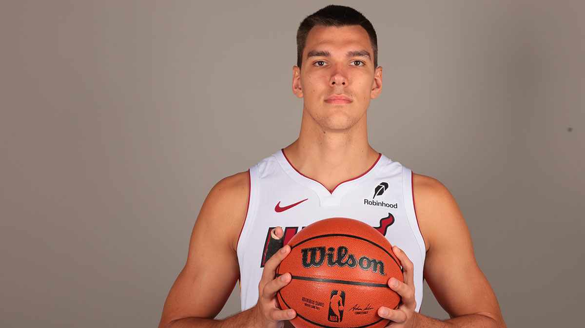 Miami Heat center Vladislav Goldin (50) poses for a photo during media day at Kaseya Center.