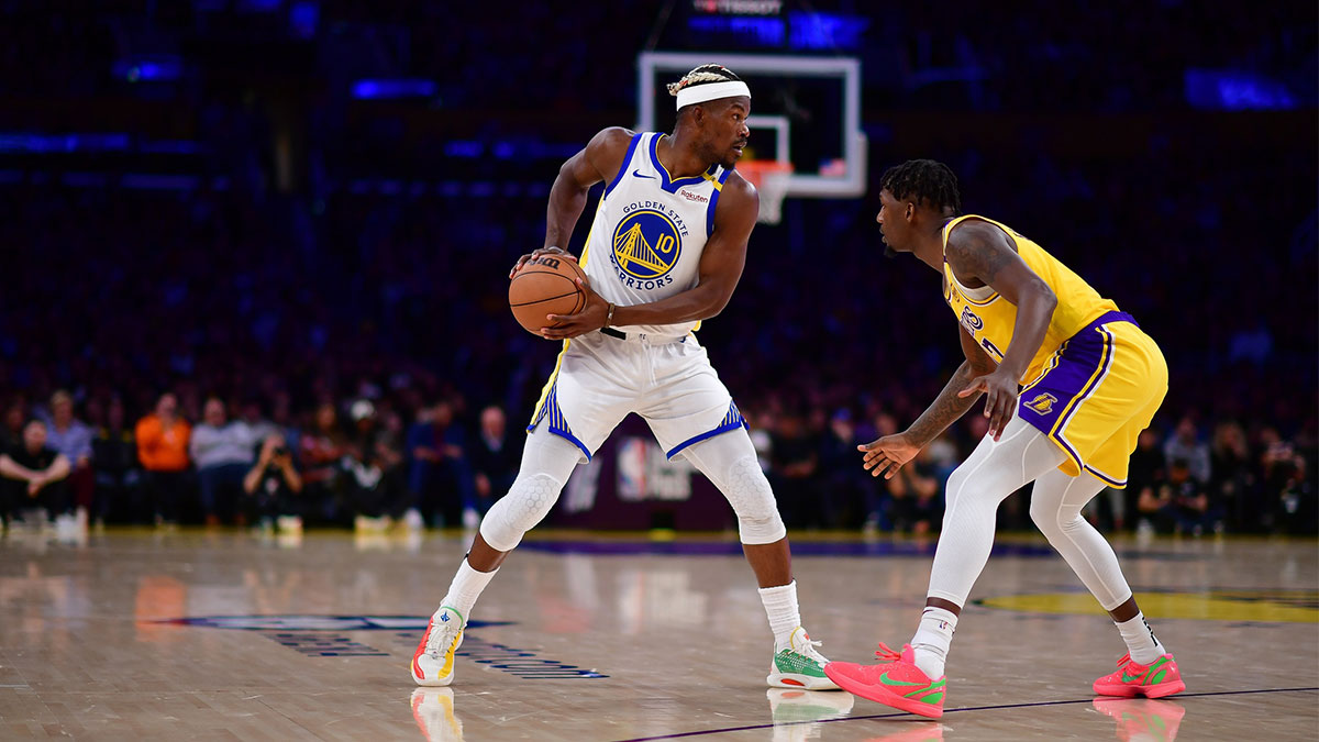 Golden State Warriors forward Jimmy Butler III (10) controls the ball against Los Angeles Lakers forward Dorian Finney-Smith (17) during the second half at Crypto.com Arena.