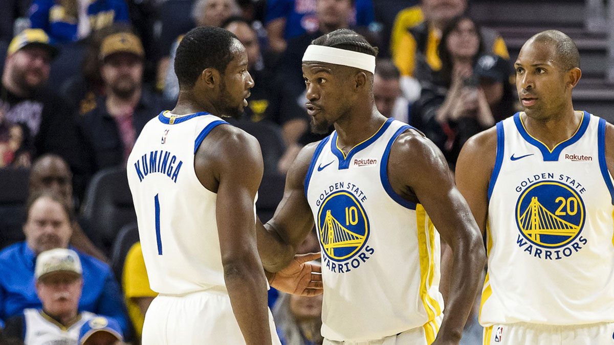 Warriors forward Jimmy Butler III (10) reacts towards forward Jonathan Kuminga (1) during the second quarter against the Portland Trail Blazers at Chase Center