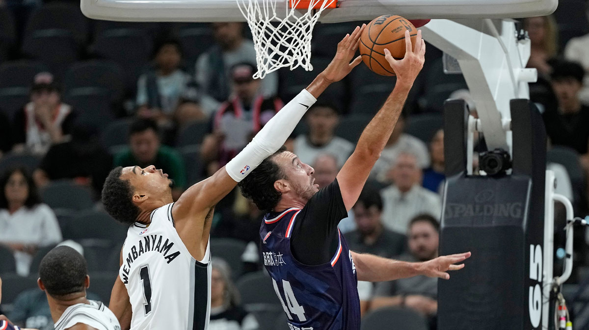 San Antonio Spurs forward-center Victor Wembanyama (1) blocks the shot attempted by Guangzhou Loong Lions forward Frank Kaminsky (44) during the first half at Frost Bank Center.