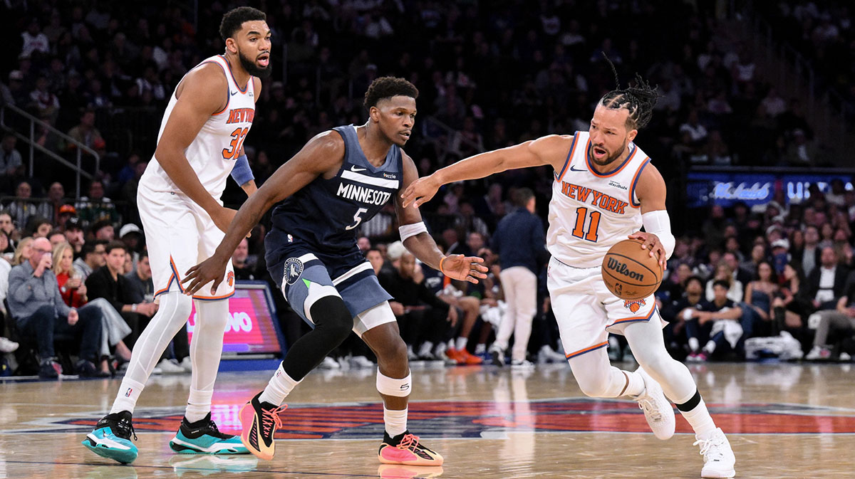 Oct 9, 2025; New York, New York, USA; New York Knicks guard Jalen Brunson (11) tries to drive past Minnesota Timberwolves guard Anthony Edwards (5) during the second half at Madison Square Garden. Mandatory Credit: John Jones-Imagn Images