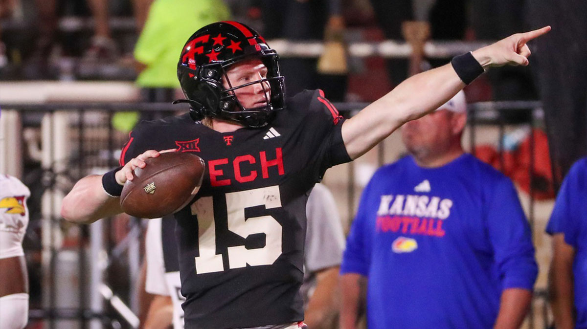 Texas Tech's Will Hammond signals for a first down after a run against Kansas during a Big 12 Conference football game at Jones AT&T Stadium in Lubbock.